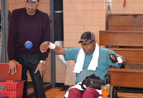 Veteran with SCI playing bocce ball at the gym at Brockton/VA Boston.