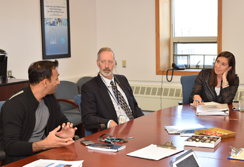 From left, DJ Patil, Ph.D., chief data scientist at the White House speaks with VA’s John Concato, M.D., M.P.H., and Stacey Whitbourne, Ph.D., about the Million Veteran Program during a visit to the VA BHS Biorepository in Jamaica Plain March 31, 2015.