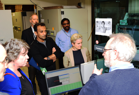 Don Humphries, scientific director, Core Laboratory, explains how blood samples are processed for the Million Veteran Program to DJ Patil, Ph.D., chief data scientist at the White House during a visit to the VA Biorepository in Jamaica Plain March 31, 2015. 