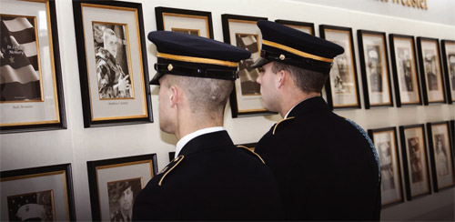 Current service members viewing the wall